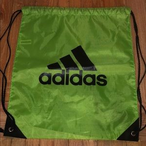 Black and green adidas workout bag